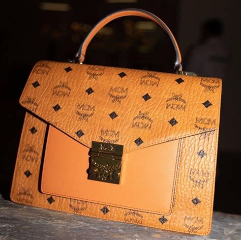 how to tell a fake mcm boston bag|authentic mcm bag.